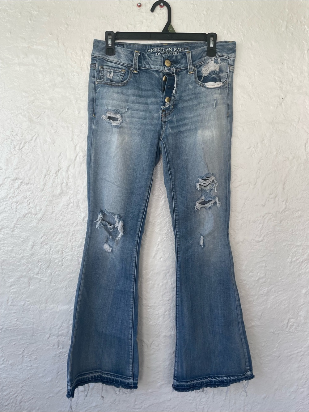 American Eagle boho artist blue low rise button fly distressed bootcut jeans; 8